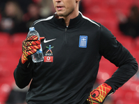 Kostas Tzolakis of Greece participates in the pre-match warm-up during the UEFA Nations League Group 2 match between England and Greece at W...