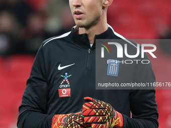 Kostas Tzolakis of Greece participates in the pre-match warm-up during the UEFA Nations League Group 2 match between England and Greece at W...