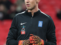 Kostas Tzolakis of Greece participates in the pre-match warm-up during the UEFA Nations League Group 2 match between England and Greece at W...