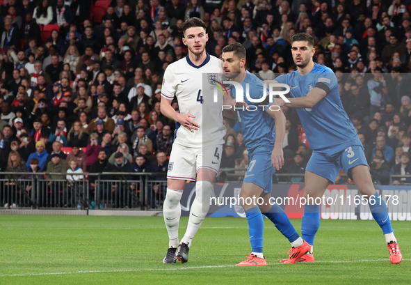 L-R Declan Rice (Arsenal) of England, Giorgos Masouras (Olympiacos) of Greece, and Konstantinos Koullerakis of Greece are in action during t...