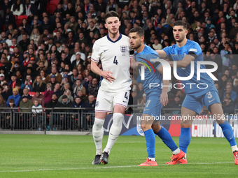 L-R Declan Rice (Arsenal) of England, Giorgos Masouras (Olympiacos) of Greece, and Konstantinos Koullerakis of Greece are in action during t...