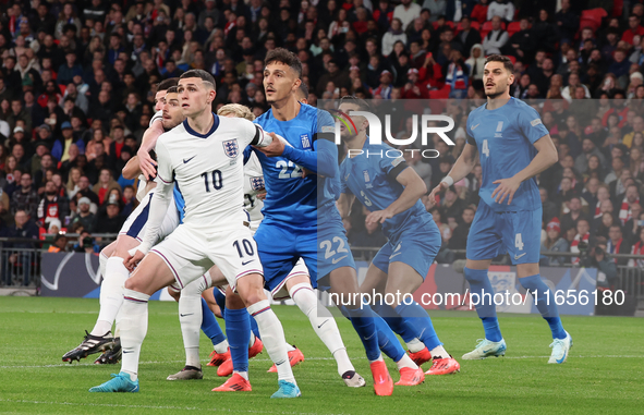 From left to right, Phil Foden of England (Manchester City), Dimitris Giannoulis of Greece, and Ninos Mavropanos of Greece (West Ham United)...