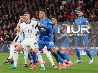 From left to right, Phil Foden of England (Manchester City), Dimitris Giannoulis of Greece, and Ninos Mavropanos of Greece (West Ham United)...