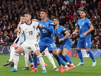 From left to right, Phil Foden of England (Manchester City), Dimitris Giannoulis of Greece, and Ninos Mavropanos of Greece (West Ham United)...