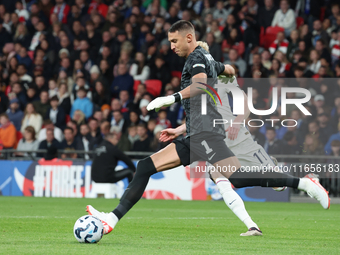 L-R Anthony Gordon of England and Odysseas Vlachodimos of Greece are in action during the UEFA Nations League Group 2 match between England...