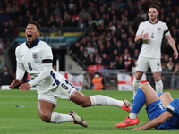 From left to right, Jude Bellingham of Real Madrid and England is tackled by Konstantinos Koullerakis of Greece during the UEFA Nations Leag...