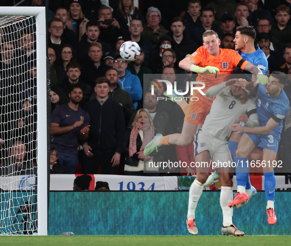 L-R Jordan Pickford (Everton) of England and Ninos Mavropanos (West Ham United) of Greece are in action during the UEFA Nations League Group...