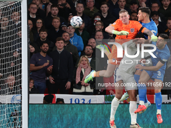 L-R Jordan Pickford (Everton) of England and Ninos Mavropanos (West Ham United) of Greece are in action during the UEFA Nations League Group...