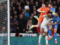 L-R Jordan Pickford (Everton) of England and Ninos Mavropanos (West Ham United) of Greece are in action during the UEFA Nations League Group...