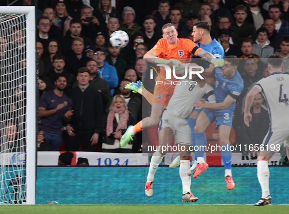 L-R Jordan Pickford (Everton) of England and Ninos Mavropanos (West Ham United) of Greece are in action during the UEFA Nations League Group...