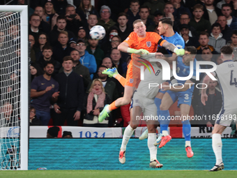 L-R Jordan Pickford (Everton) of England and Ninos Mavropanos (West Ham United) of Greece are in action during the UEFA Nations League Group...