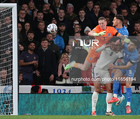 L-R Jordan Pickford (Everton) of England and Ninos Mavropanos (West Ham United) of Greece are in action during the UEFA Nations League Group...