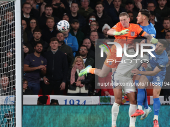 L-R Jordan Pickford (Everton) of England and Ninos Mavropanos (West Ham United) of Greece are in action during the UEFA Nations League Group...