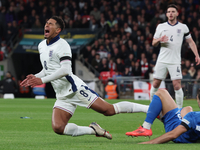 From left to right, Jude Bellingham of Real Madrid and England is tackled by Konstantinos Koullerakis of Greece during the UEFA Nations Leag...