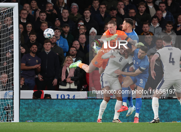 L-R Jordan Pickford (Everton) of England and Ninos Mavropanos (West Ham United) of Greece are in action during the UEFA Nations League Group...