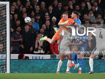 L-R Jordan Pickford (Everton) of England and Ninos Mavropanos (West Ham United) of Greece are in action during the UEFA Nations League Group...