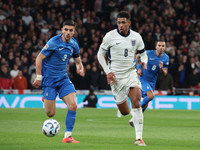 L-R Konstantinos Koullerakls of Greece and Jude Bellingham of England in action during the UEFA Nations League Group 2 match between England...