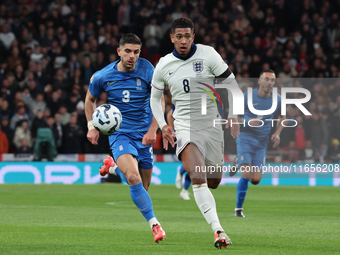 L-R Konstantinos Koullerakls of Greece and Jude Bellingham of England in action during the UEFA Nations League Group 2 match between England...