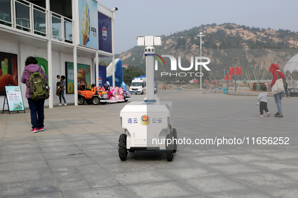 A public security intelligent security robot patrols a park in Lianyungang, China, on October 11, 2024. 