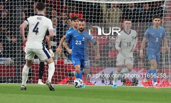 Manolis Siopis of Cardiff City and Greece is in action during the UEFA Nations League Group 2 match between England and Greece at Wembley St...