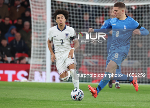 From left to right, Rico Lewis of Manchester City, England, and Christos Tzolis of Greece are in action during the UEFA Nations League Group...