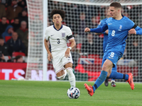 From left to right, Rico Lewis of Manchester City, England, and Christos Tzolis of Greece are in action during the UEFA Nations League Group...