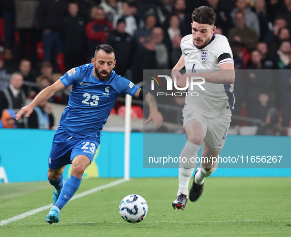 L-R Manolis Siopis of Greece, from Cardiff City, takes on Declan Rice of England, from Arsenal, during the UEFA Nations League Group 2 match...