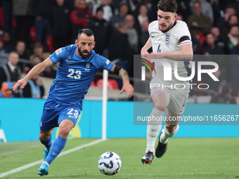 L-R Manolis Siopis of Greece, from Cardiff City, takes on Declan Rice of England, from Arsenal, during the UEFA Nations League Group 2 match...