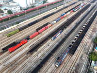 A cargo train prepares to depart at a railway marshalling station in Lianyungang, China, on October 11, 2024. (