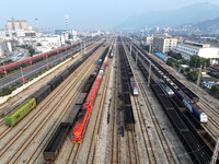 A cargo train prepares to depart at a railway marshalling station in Lianyungang, China, on October 11, 2024. (