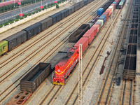 A cargo train prepares to depart at a railway marshalling station in Lianyungang, China, on October 11, 2024. (