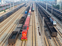 A cargo train prepares to depart at a railway marshalling station in Lianyungang, China, on October 11, 2024. (