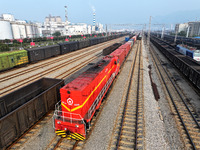 A cargo train prepares to depart at a railway marshalling station in Lianyungang, China, on October 11, 2024. (