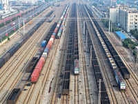 A cargo train prepares to depart at a railway marshalling station in Lianyungang, China, on October 11, 2024. (