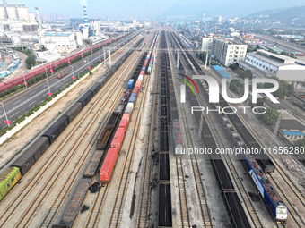 A cargo train prepares to depart at a railway marshalling station in Lianyungang, China, on October 11, 2024. (