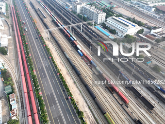 A cargo train prepares to depart at a railway marshalling station in Lianyungang, China, on October 11, 2024. (