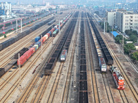 A cargo train prepares to depart at a railway marshalling station in Lianyungang, China, on October 11, 2024. (