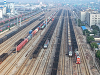 A cargo train prepares to depart at a railway marshalling station in Lianyungang, China, on October 11, 2024. (