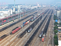 A cargo train prepares to depart at a railway marshalling station in Lianyungang, China, on October 11, 2024. (