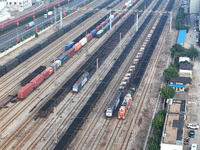 A cargo train prepares to depart at a railway marshalling station in Lianyungang, China, on October 11, 2024. (