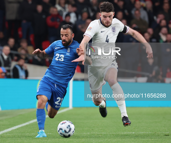 L-R Manolis Siopis of Greece, from Cardiff City, takes on Declan Rice of England, from Arsenal, during the UEFA Nations League Group 2 match...