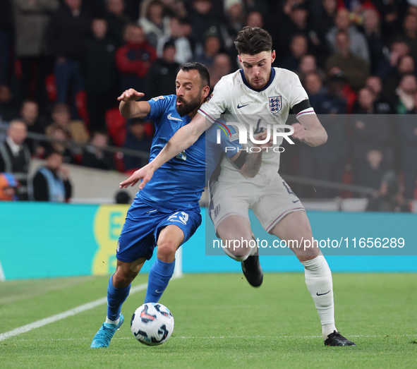 L-R Manolis Siopis of Greece, from Cardiff City, takes on Declan Rice of England, from Arsenal, during the UEFA Nations League Group 2 match...