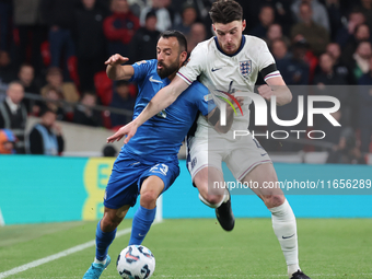 L-R Manolis Siopis of Greece, from Cardiff City, takes on Declan Rice of England, from Arsenal, during the UEFA Nations League Group 2 match...