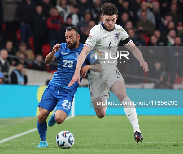 L-R Manolis Siopis of Greece, from Cardiff City, takes on Declan Rice of England, from Arsenal, during the UEFA Nations League Group 2 match...