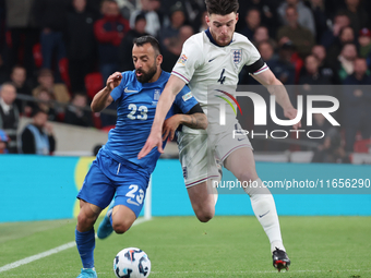 L-R Manolis Siopis of Greece, from Cardiff City, takes on Declan Rice of England, from Arsenal, during the UEFA Nations League Group 2 match...