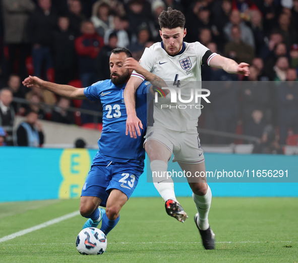 L-R Manolis Siopis of Greece, from Cardiff City, takes on Declan Rice of England, from Arsenal, during the UEFA Nations League Group 2 match...