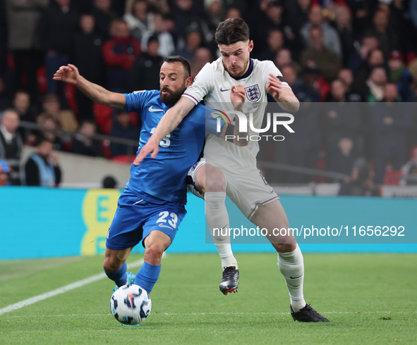 L-R Manolis Siopis of Greece, from Cardiff City, takes on Declan Rice of England, from Arsenal, during the UEFA Nations League Group 2 match...