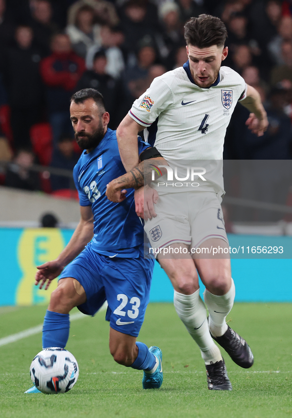 L-R Manolis Siopis of Greece, from Cardiff City, takes on Declan Rice of England, from Arsenal, during the UEFA Nations League Group 2 match...