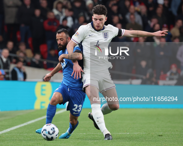 L-R Manolis Siopis of Greece, from Cardiff City, takes on Declan Rice of England, from Arsenal, during the UEFA Nations League Group 2 match...