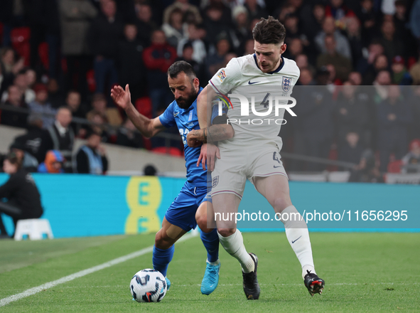 L-R Manolis Siopis of Greece, from Cardiff City, takes on Declan Rice of England, from Arsenal, during the UEFA Nations League Group 2 match...